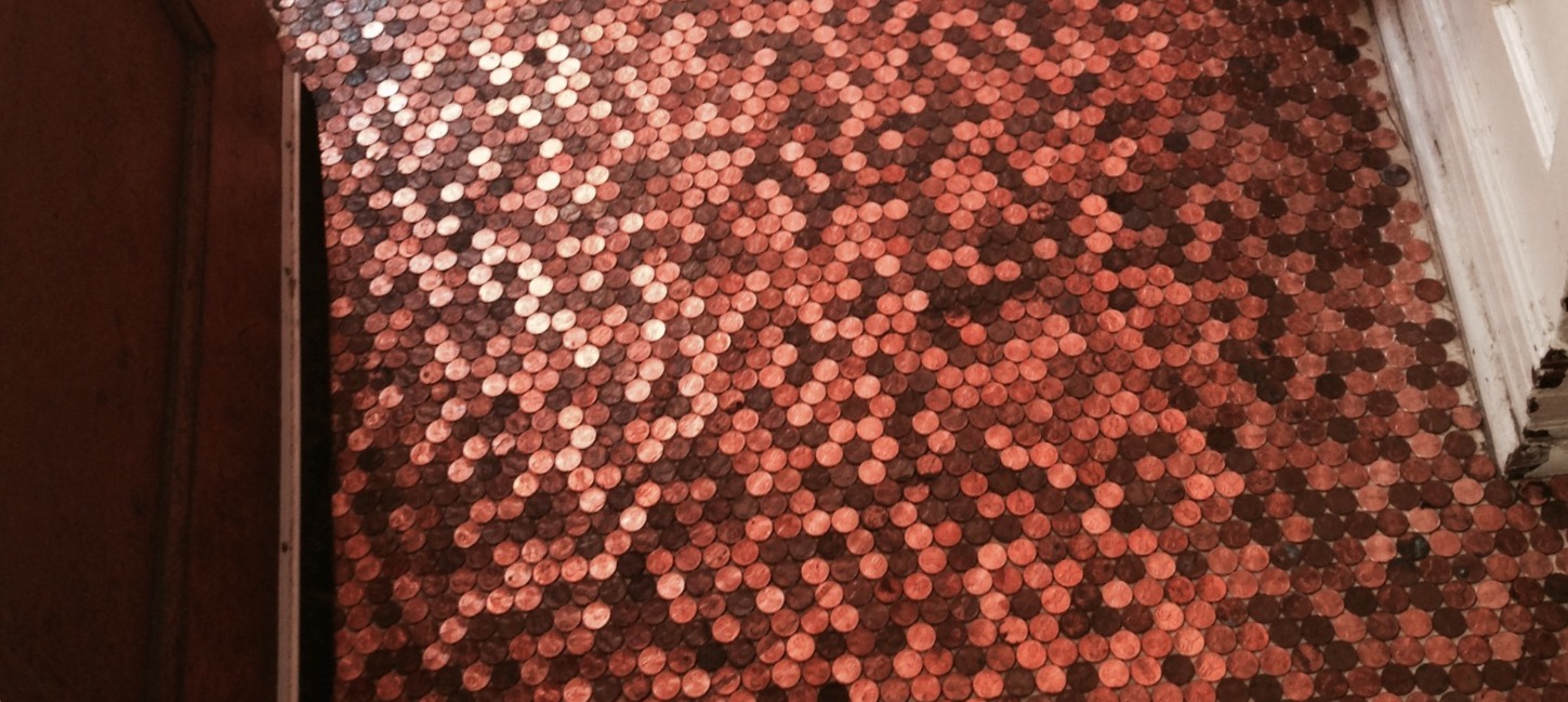 Handmade penny-tile floor detail